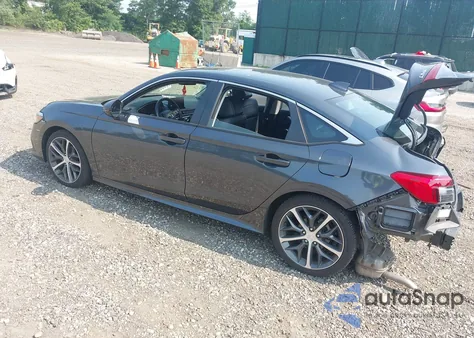 2023 Honda Civic Touring z USA, uszkodzony, nr VIN 2HGFE1F97PH323864